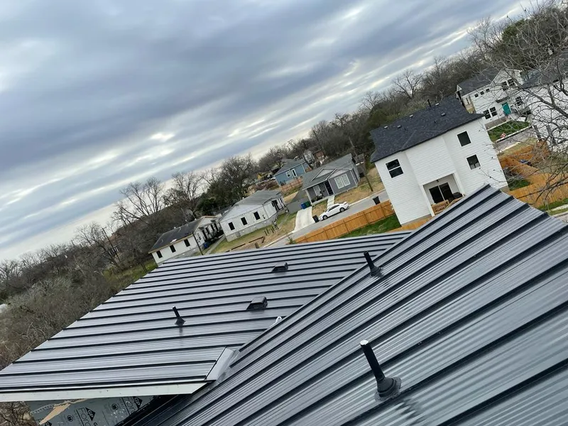 Standing seam metal roof panels with vents for Skylight Repair in Kittery